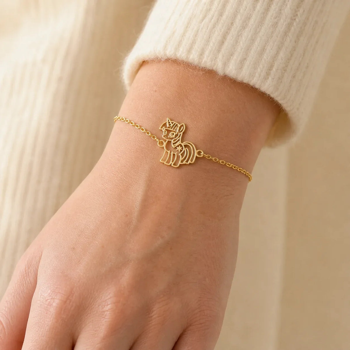 DRAWELL gold tone custom drawing chain bracelet close-up
