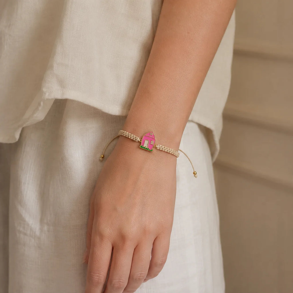 DRAWELL custom house enamel cord bracelet worn on wrist