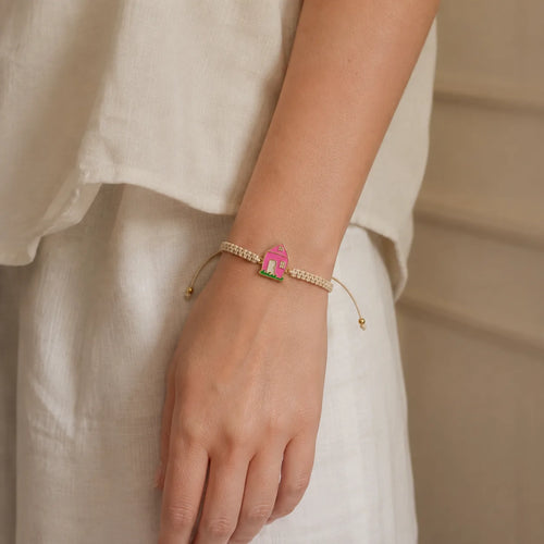 DRAWELL custom house enamel cord bracelet worn on wrist