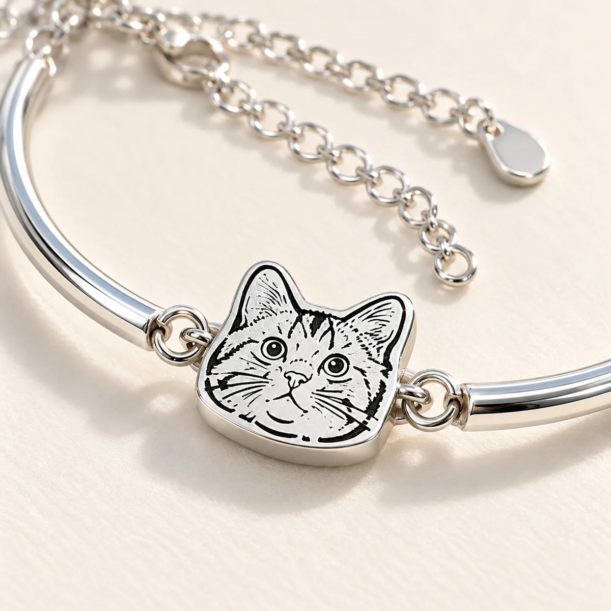 Personalized silver pet portrait bangle engraving and metal detail