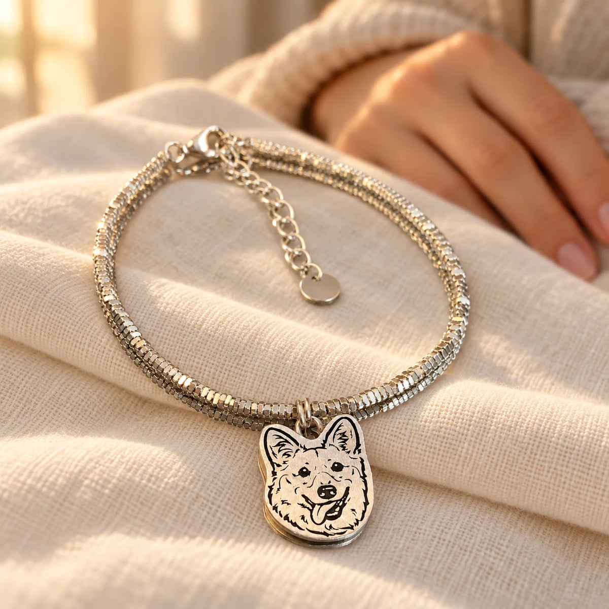 Personalized silver pet portrait bracelet keepsake on ivory linen