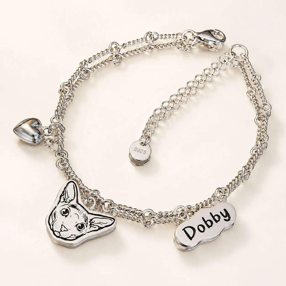 Custom silver cat portrait bracelet with personalized Dobby name plate