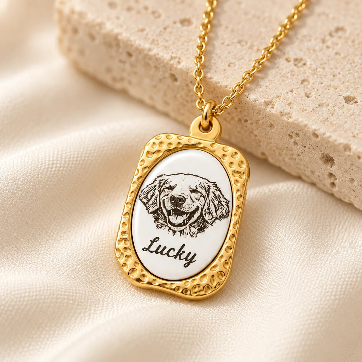 Gold-tone custom pet portrait necklace, detail view with dog portrait and Lucky name