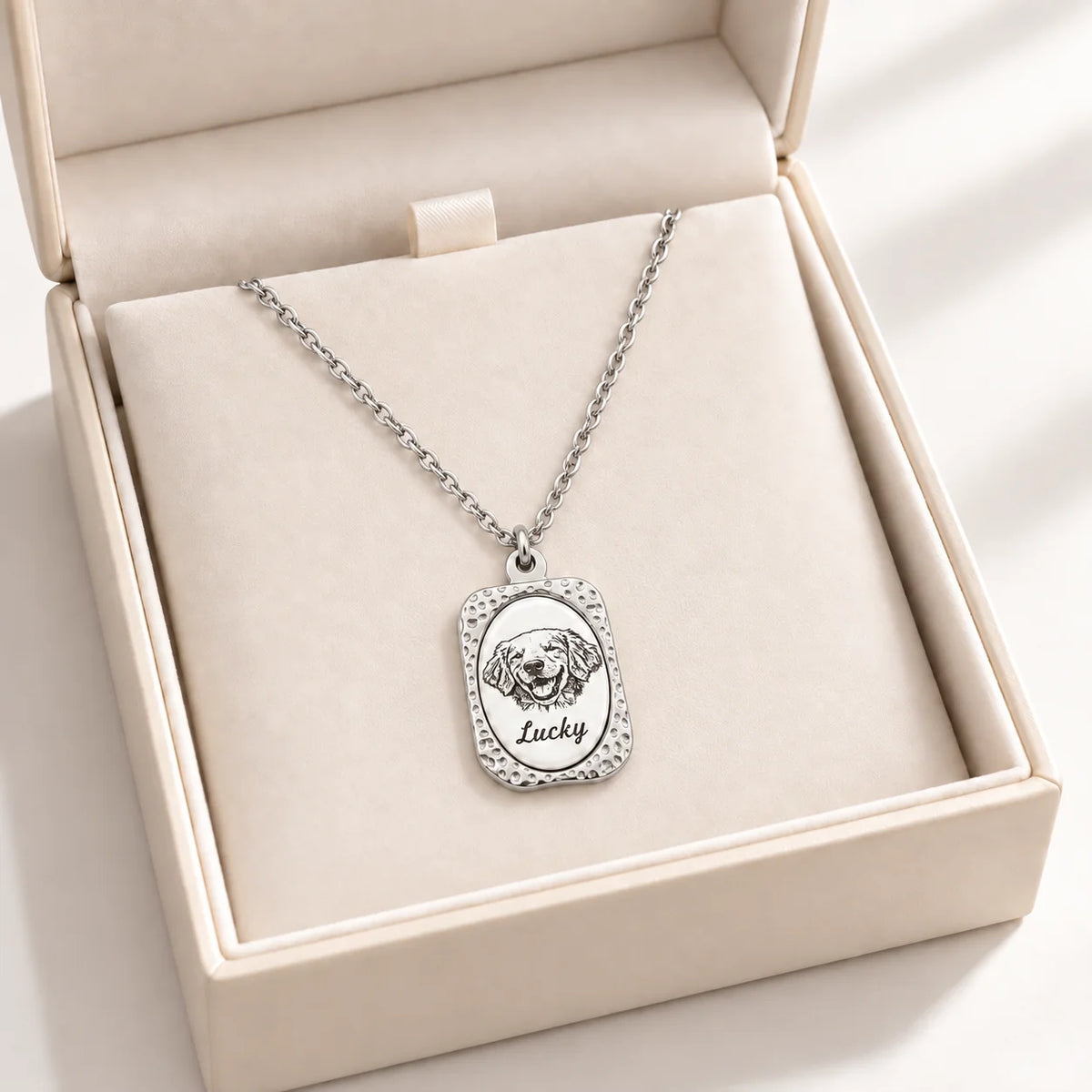 Silver-tone custom pet portrait necklace, gift box view with dog portrait and Lucky name