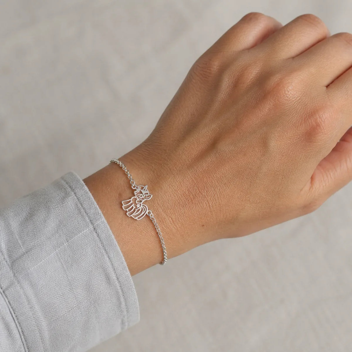 DRAWELL silver tone custom drawing chain bracelet close-up