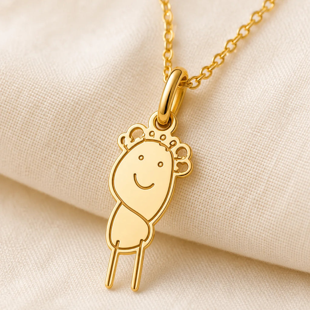 Close-up detail of a custom DRAWELL necklace in gold finish