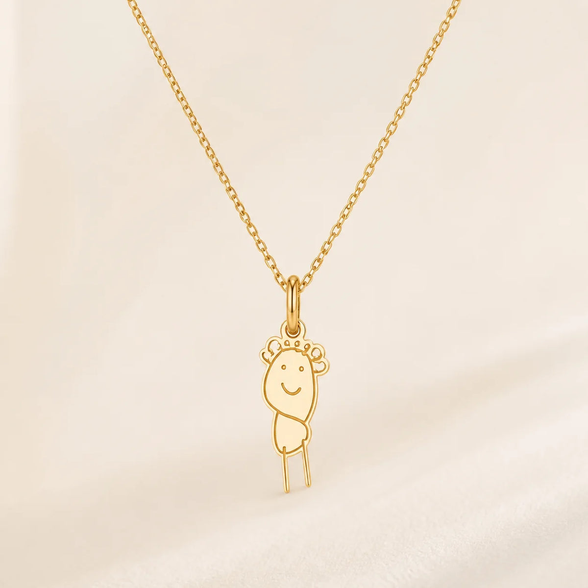 Custom DRAWELL necklace in gold finish, front view